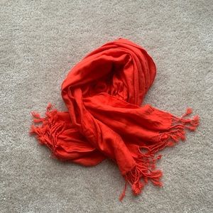 Reddish-orange scarf